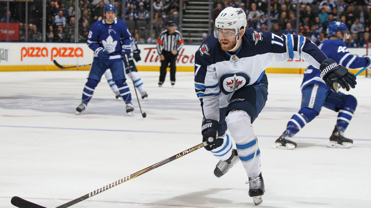 TORONTO, ON - MARCH 31: Adam Lowry #17 of the Winnipeg Jets skates against the Toronto Maple Leafs during an NHL game at the Air Canada Centre on March 31, 2018 in Toronto, Ontario, Canada. The Jets defeated the Maple Leafs 3-1. *** Local Caption *** Adam Lowry