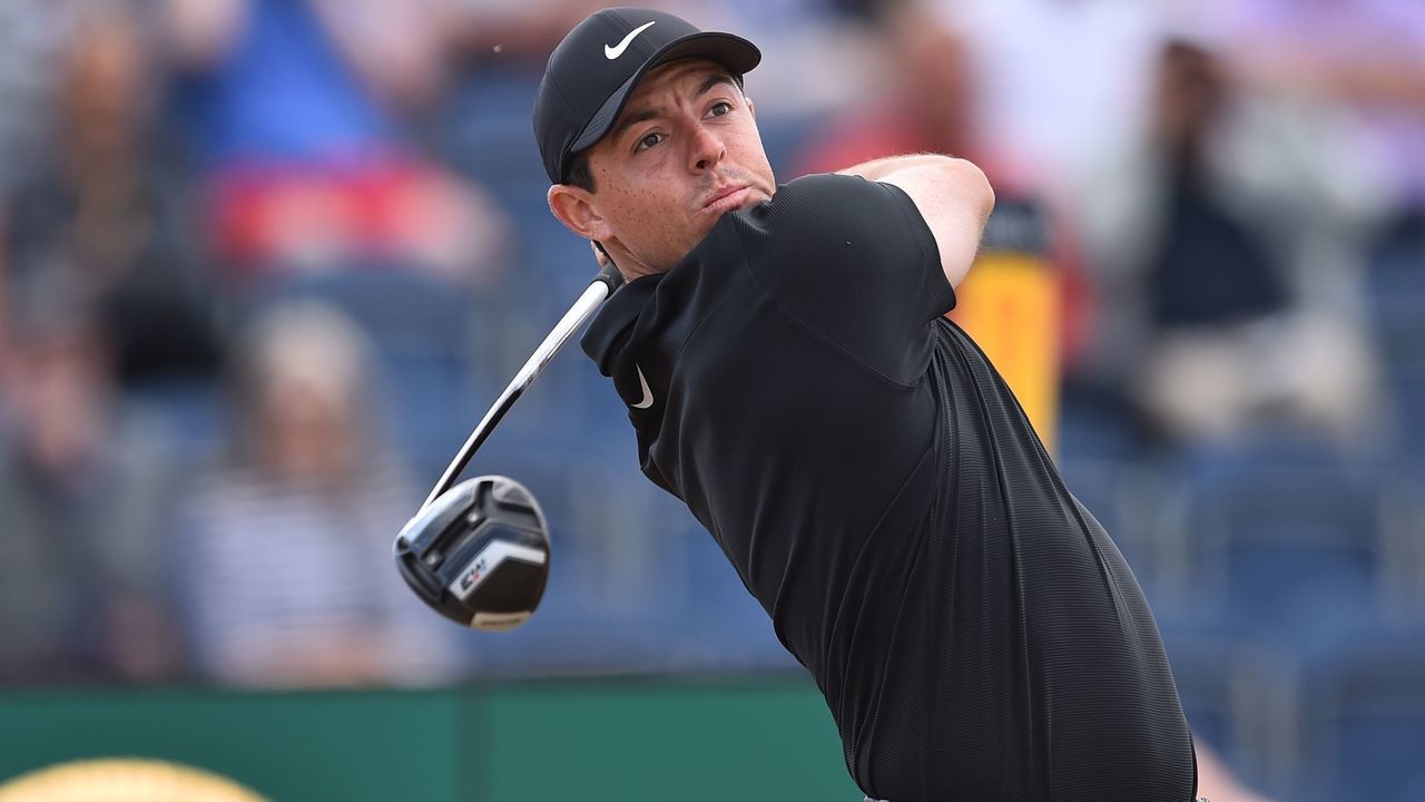 Northern Ireland's Rory McIlroy watches his drive from the 3rd tee during his first round on day one of The 147th Open golf Championship at Carnoustie, Scotland on July 19, 2018.