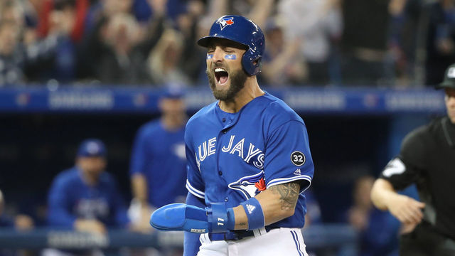 TORONTO, ON - MARCH 31: Kevin Pillar #11 of the Toronto Blue Jays celebrates as he steals home plate in the eighth inning during MLB game action against the New York Yankees at Rogers Centre on March 31, 2018 in Toronto, Canada.