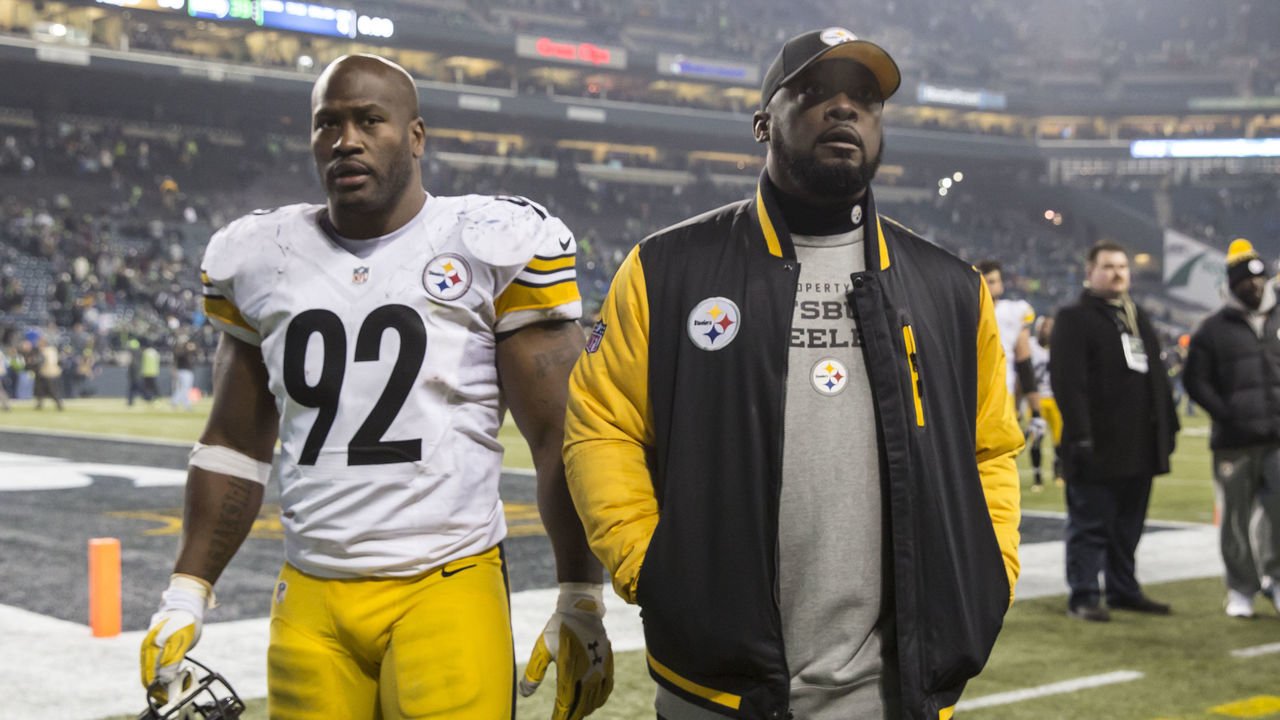 SEATTLE, WA - NOVEMBER 29: Linebacker James Harrison #92 of the Pittsburgh Steelers and head coach Mike Tomlin walk off the field after a football game against the Seattle Seahawks at CenturyLink Field on November 29, 2015 in Seattle, Washington. The Seahawks won the game 39-30.