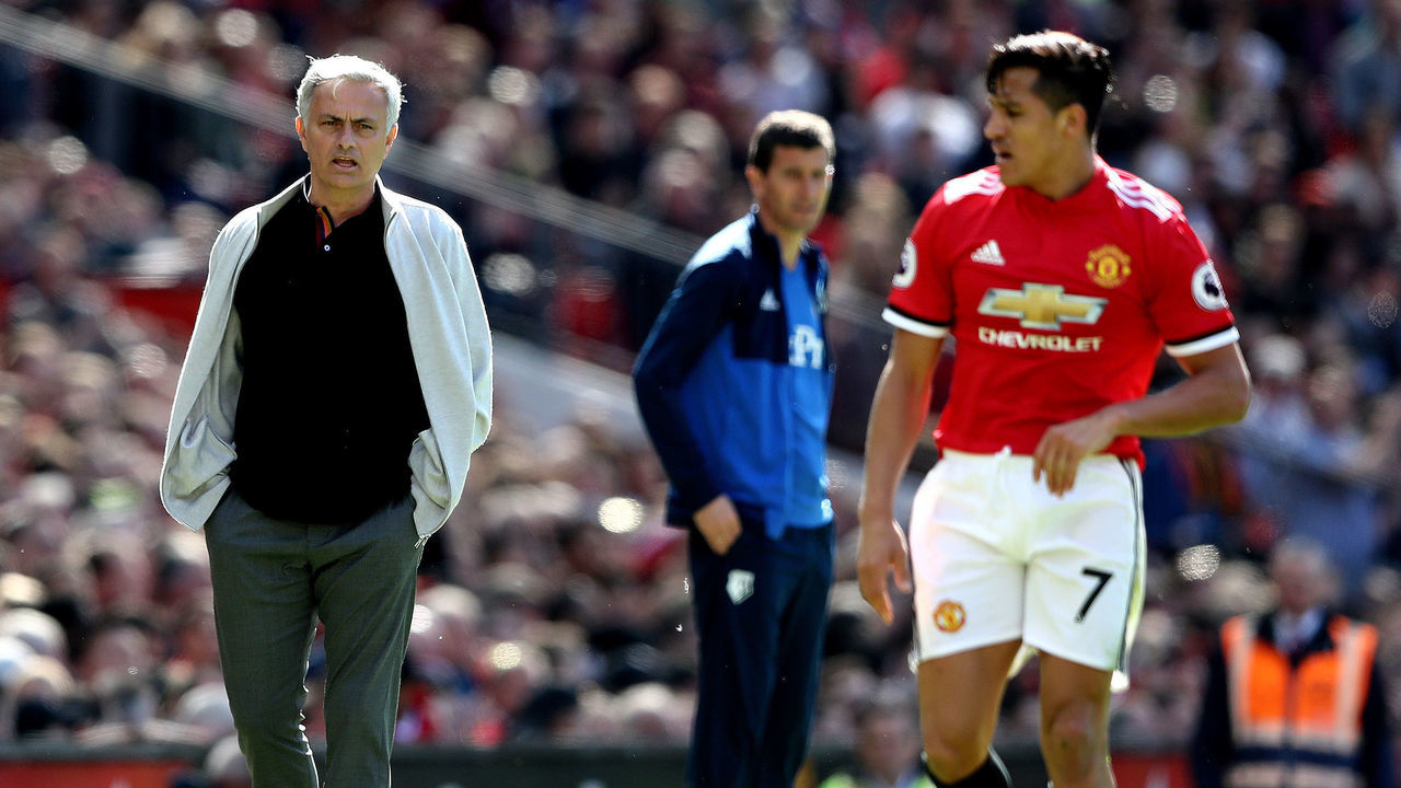 MANCHESTER, ENGLAND - MAY 13: Jose Mourinho, Manager of Manchester United looks on as Alexis Sanchez of Manchester United looks on during the Premier League match between Manchester United and Watford at Old Trafford on May 13, 2018 in Manchester, England.