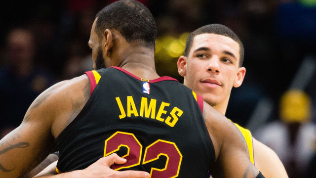 CLEVELAND, OH - DECEMBER 14: LeBron James #23 of the Cleveland Cavaliers and Lonzo Ball #2 of the Los Angeles Lakers embrace during the first half at Quicken Loans Arena on December 14, 2017 in Cleveland, Ohio.
