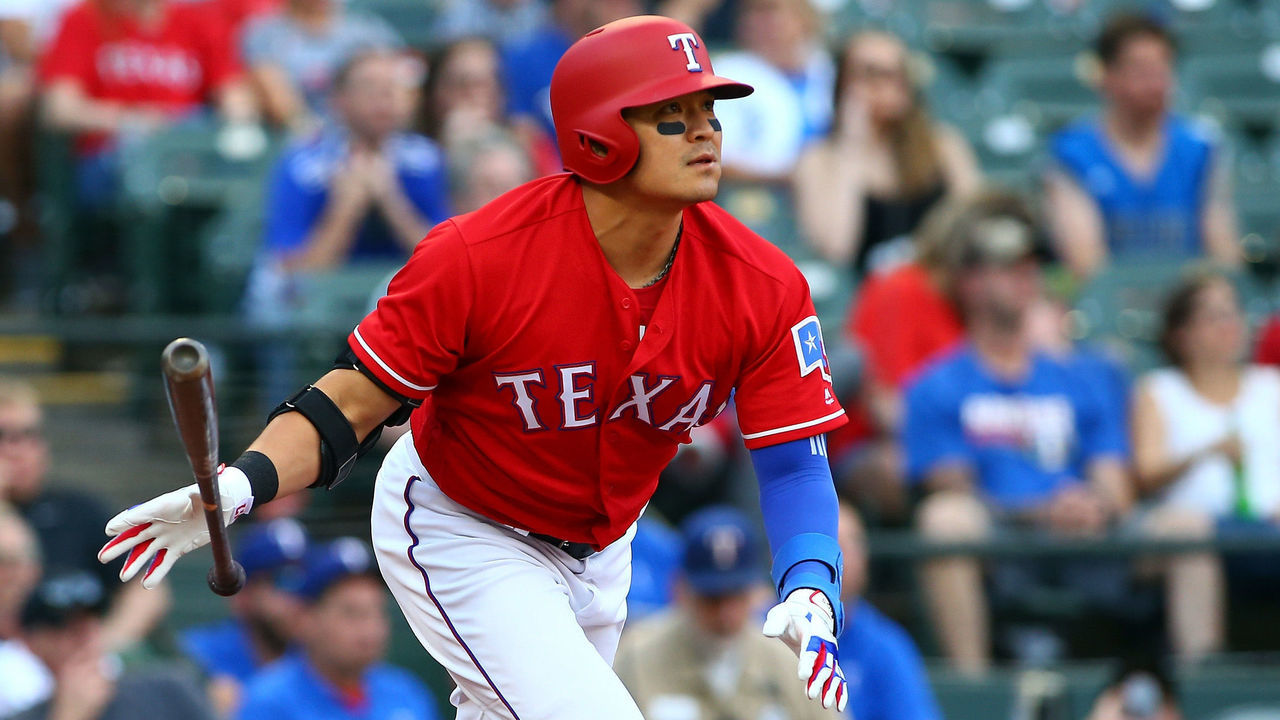 ARLINGTON, TX - MAY 25: Shin-Soo Choo #17 of the Texas Rangers hits a solo home run in the first inning against the Kansas City Royals at Globe Life Park in Arlington on May 25, 2018 in Arlington, Texas.