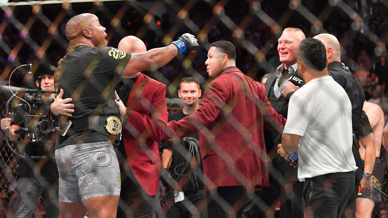 LAS VEGAS, NV - JULY 07: Daniel Cormier (L) challenges Brock Lesnar (R) after winning his heavyweight championship fight against Stipe Miocic at T-Mobile Arena on July 7, 2018 in Las Vegas, Nevada. Cormier won by first round knockout.