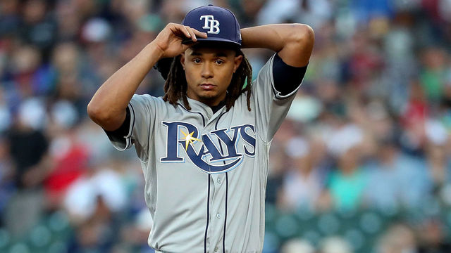 SEATTLE, WA - JUNE 02: Chris Archer #22 of the Tampa Bay Rays reacts after giving up an RBI single to Nelson Cruz #23 in the third inning to score Jean Segura #2 of the Seattle Mariners during their game at Safeco Field on June 2, 2018 in Seattle, Washington.