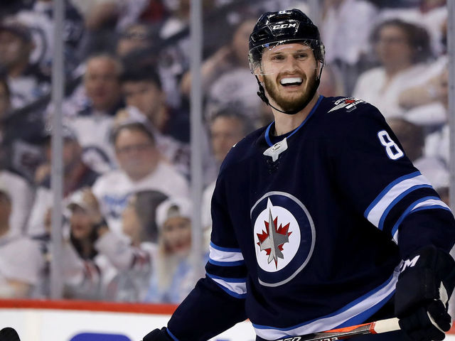 WINNIPEG, MB - MAY 12: Jacob Trouba #8 of the Winnipeg Jets reacts after he is called for cross checking against the Vegas Golden Knights in Game One of the Western Conference Finals during the 2018 NHL Stanley Cup Playoffs at Bell MTS Place on May 12, 2018 in Winnipeg, Canada.