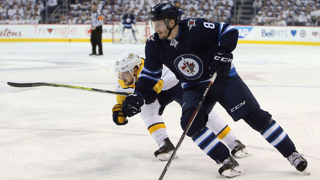 WINNIPEG, MANITOBA - MAY 3: Jacob Trouba #8 of the Winnipeg Jets beats Viktor Arvidsson #33 of the Nashville Predators in Game Four of the Western Conference Second Round during the 2018 NHL Stanley Cup Playoffs on May 3, 2018 at Bell MTS Place in Winnipeg, Manitoba, Canada. *** Local Caption *** Jacob Trouba; Viktor Arvidsson'n