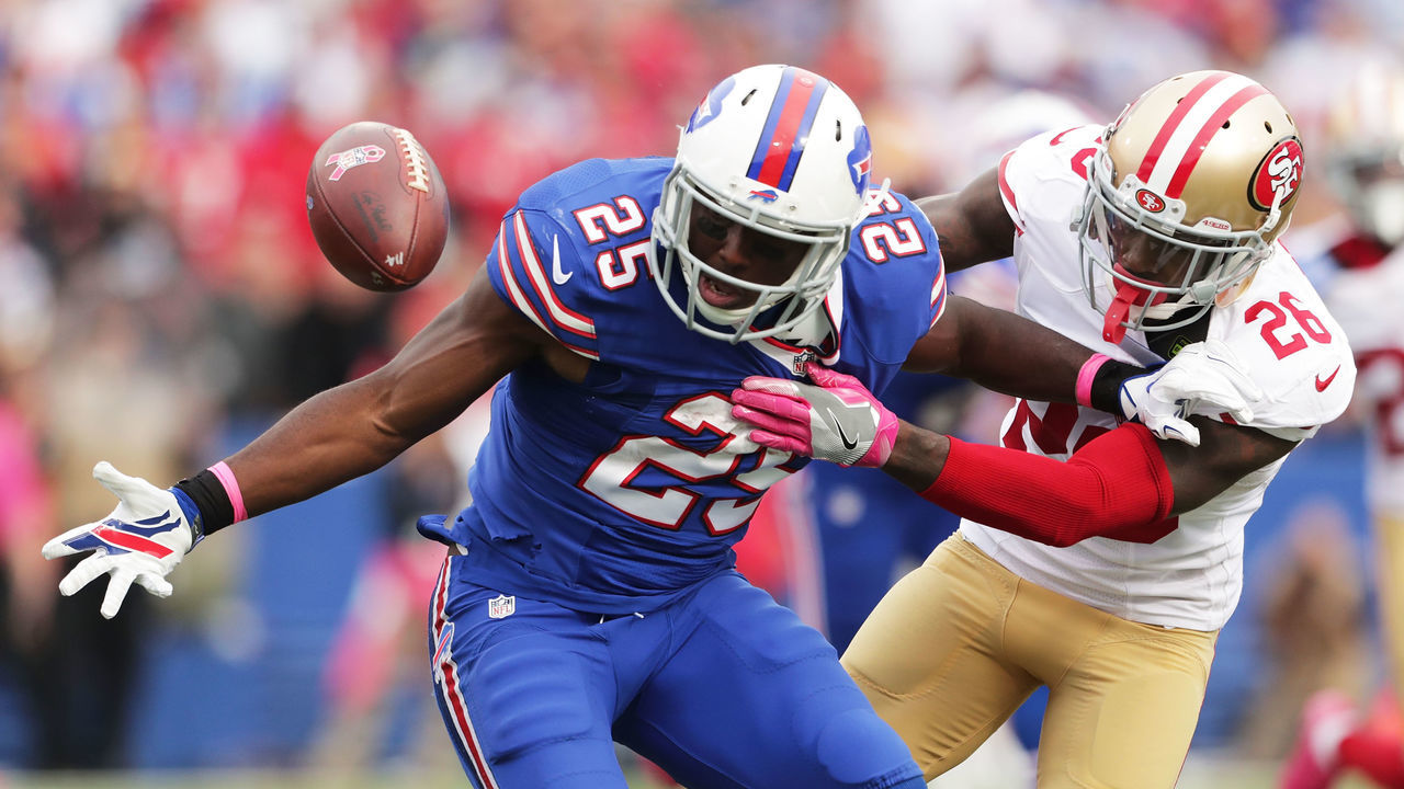 BUFFALO, NY - OCTOBER 16: LeSean McCoy #25 of the Buffalo Bills fumbles the ball but regains possesion as Tramaine Brock #26 of the San Francisco 49ers defends during the second half at New Era Field on October 16, 2016 in Buffalo, New York.