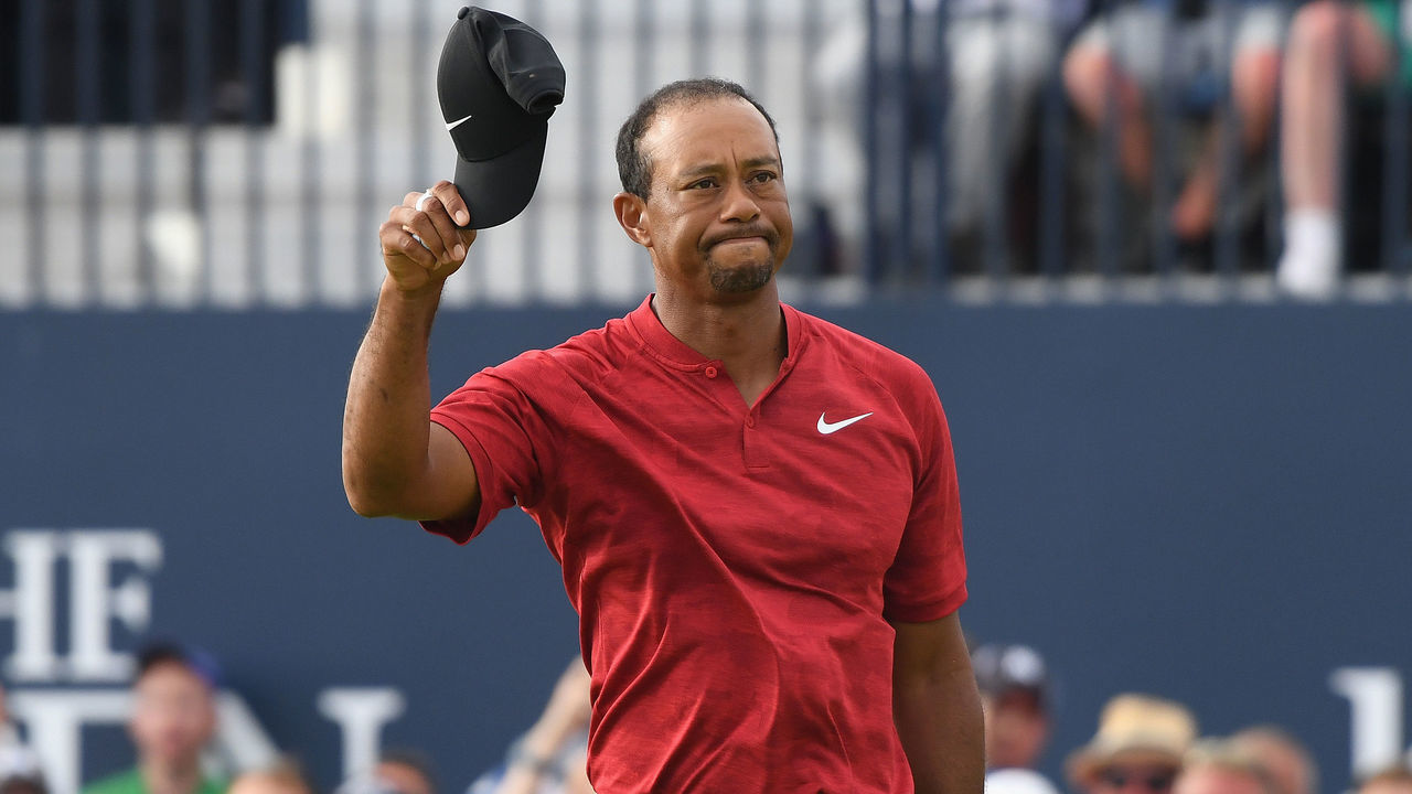 CARNOUSTIE, SCOTLAND - JULY 22: Tiger Woods of the United States acknowledges the crowd on the 18th green during the final round of the 147th Open Championship at Carnoustie Golf Club on July 22, 2018 in Carnoustie, Scotland.
