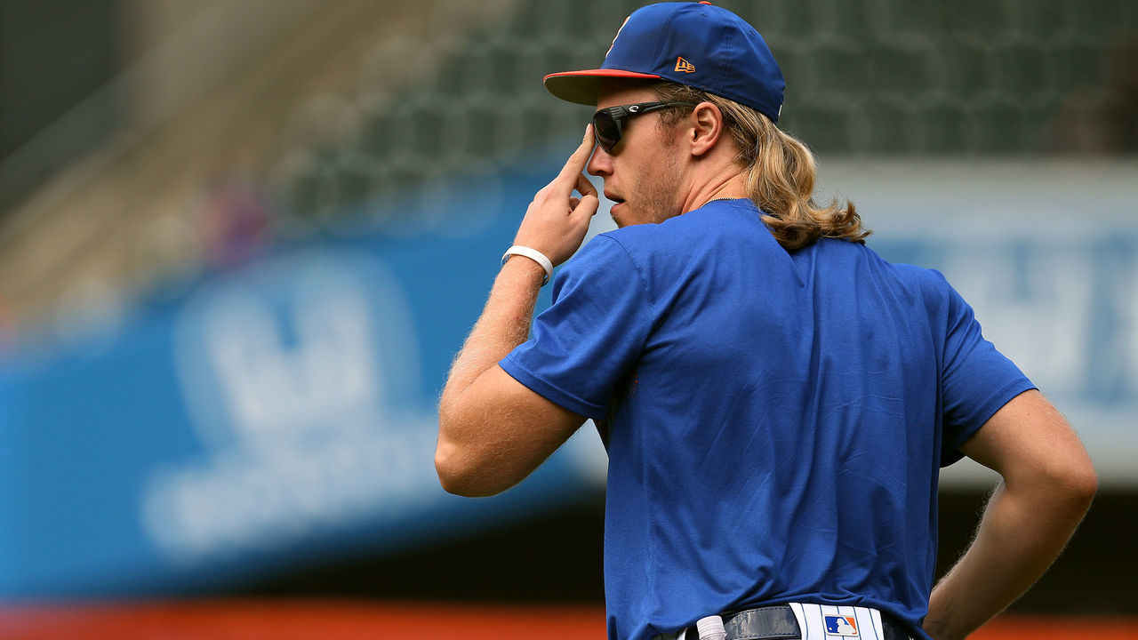 NEW YORK, NY - JULY 11: Noah Syndergaard #34 of the New York Mets runs onto the filed before a game against of the Philadelphia Phillies at Citi Field on July 11, 2018 in the Flushing neighborhood of the Queens borough of New York City.