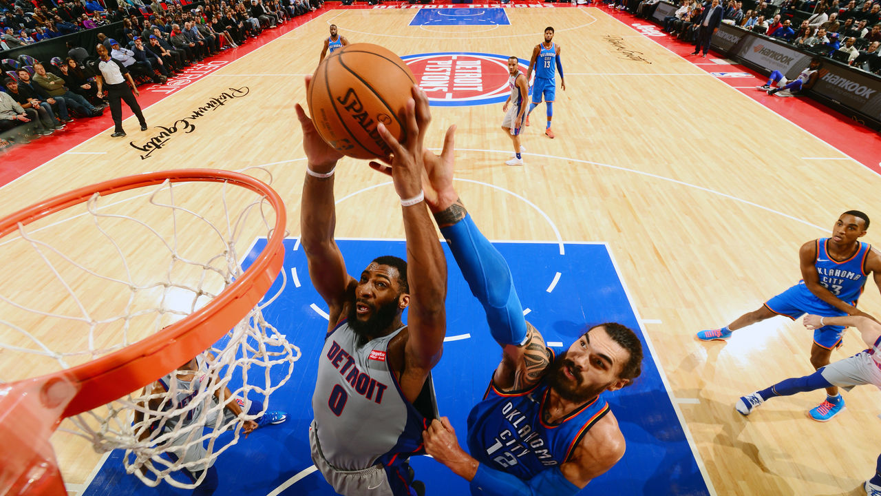 DETROIT, MI - JANUARY 27: Andre Drummond #0 of the Detroit Pistons dunks against Steven Adams #12 of the Oklahoma City Thunder on January 27, 2018 at Little Caesars Arena in Detroit, Michigan. NOTE TO USER: User expressly acknowledges and agrees that, by downloading and/or using this photograph, User is consenting to the terms and conditions of the Getty Images License Agreement. Mandatory Copyright Notice: Copyright 2018 NBAE