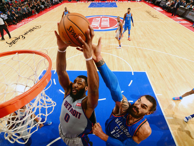 DETROIT, MI - JANUARY 27: Andre Drummond #0 of the Detroit Pistons dunks against Steven Adams #12 of the Oklahoma City Thunder on January 27, 2018 at Little Caesars Arena in Detroit, Michigan. NOTE TO USER: User expressly acknowledges and agrees that, by downloading and/or using this photograph, User is consenting to the terms and conditions of the Getty Images License Agreement. Mandatory Copyright Notice: Copyright 2018 NBAE