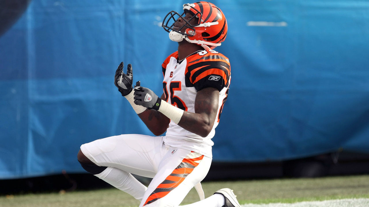 SAN DIEGO - DECEMBER 20: Wide receiver Chad Ochocinco #85 of the Cincinnati Bengals reacts in the end zone after making a 49 yard touchdown catch against the San Diego Chargers on December 20, 2009 at Qualcomm Stadium in San Diego, California.
