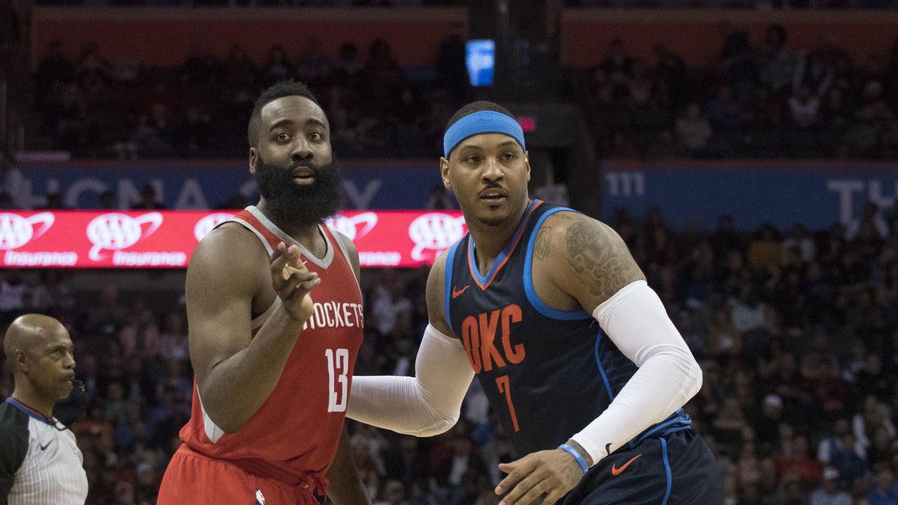 OKLAHOMA CITY, OK - DECEMBER 25: James Harden #13 of the Houston Rockets and Carmelo Anthony #7 of the Oklahoma City Thunder during the second half of a NBA game at the Chesapeake Energy Arena on December 25, 2017 in Oklahoma City, Oklahoma. The Thunder defeated the Rockets 112-107.