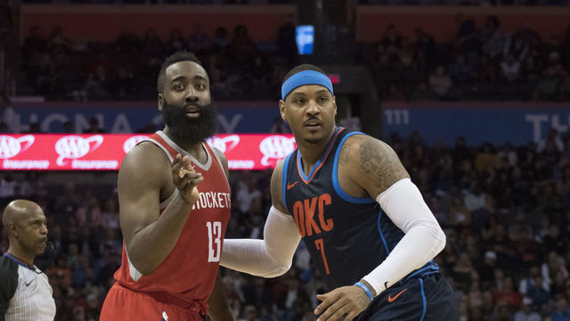 OKLAHOMA CITY, OK - DECEMBER 25: James Harden #13 of the Houston Rockets and Carmelo Anthony #7 of the Oklahoma City Thunder during the second half of a NBA game at the Chesapeake Energy Arena on December 25, 2017 in Oklahoma City, Oklahoma. The Thunder defeated the Rockets 112-107.