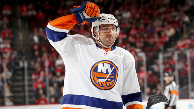 NEWARK, NJ - MARCH 31: Johnny Boychuk #55 of the New York Islanders celebrates teammate Chris Wagner's goal in the third period against the New Jersey Devils on March 31, 2018 at Prudential Center in Newark, New Jersey.