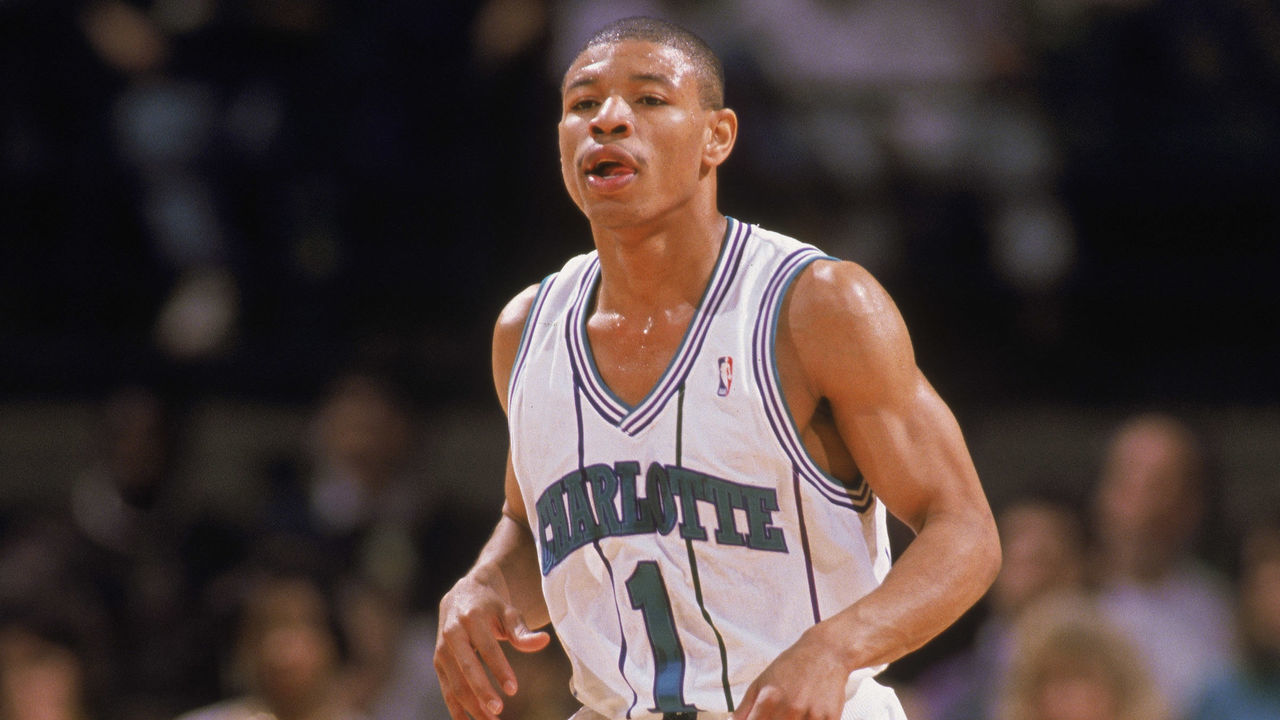 CHARLOTTE, NC - 1989: Mugsy Bogues #1 of the Charlotte Hornets dribbles the ball during an NBA game at Charlotte Colesium in 1989.
