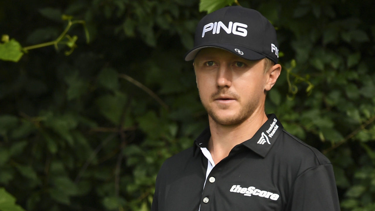 OAKVILLE, ON - JULY 25: Mackenzie Hughes of Canada looks on prior to hitting a tee shot from the sixteenth during the practice rounds at the RBC Canadian Open at Glen Abbey Golf Club on July 25, 2018 in Oakville, Canada.