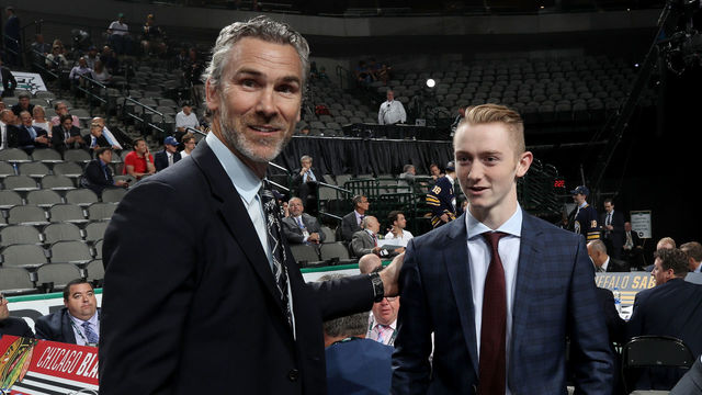 DALLAS, TX - JUNE 23: Trevor Linden talks with Tyler Madden reacts after being selected 68th overall by the Vancouver Canucks during the 2018 NHL Draft at American Airlines Center on June 23, 2018 in Dallas, Texas.