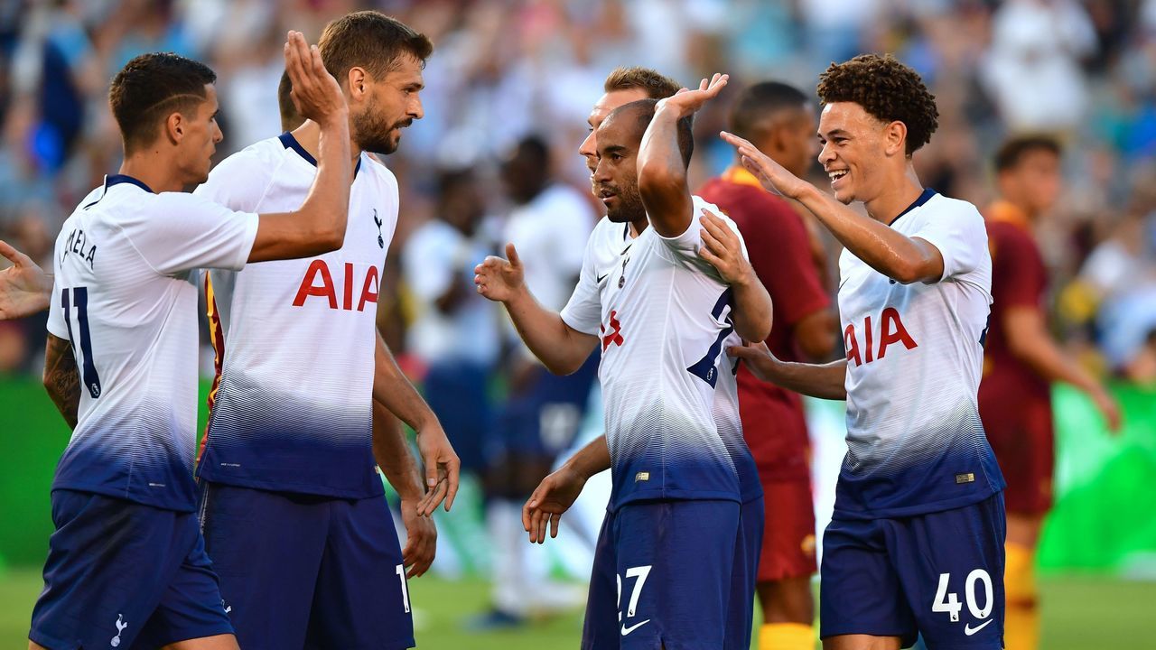 Tottenham players celebrate with goalscorer Lucas Moura (C) after he scored an equalizer against AS Roma during their International Champions Cup match in San Diego, California on July 25, 2018, where Tottenham defeated Roma 4-1.