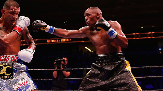 GLENDALE, AZ - OCTOBER 14: Aron Martinez (L) and Devon Alexander (R) square off during the main event welterweight bout at Gila River Arena on October 14, 2015 in Glendale, Arizona.