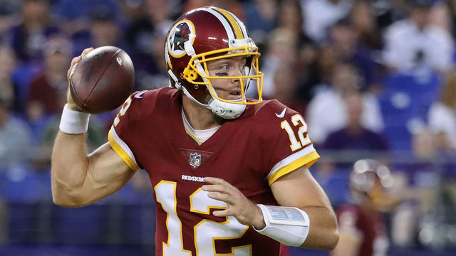 BALTIMORE, MD - AUGUST 10: Quarterback quarterback Colt McCoy #12 of the Washington Redskins throws a first half pass against the Baltimore Ravens during a preseason game at M&T Bank Stadium on August 10, 2017 in Baltimore, Maryland.