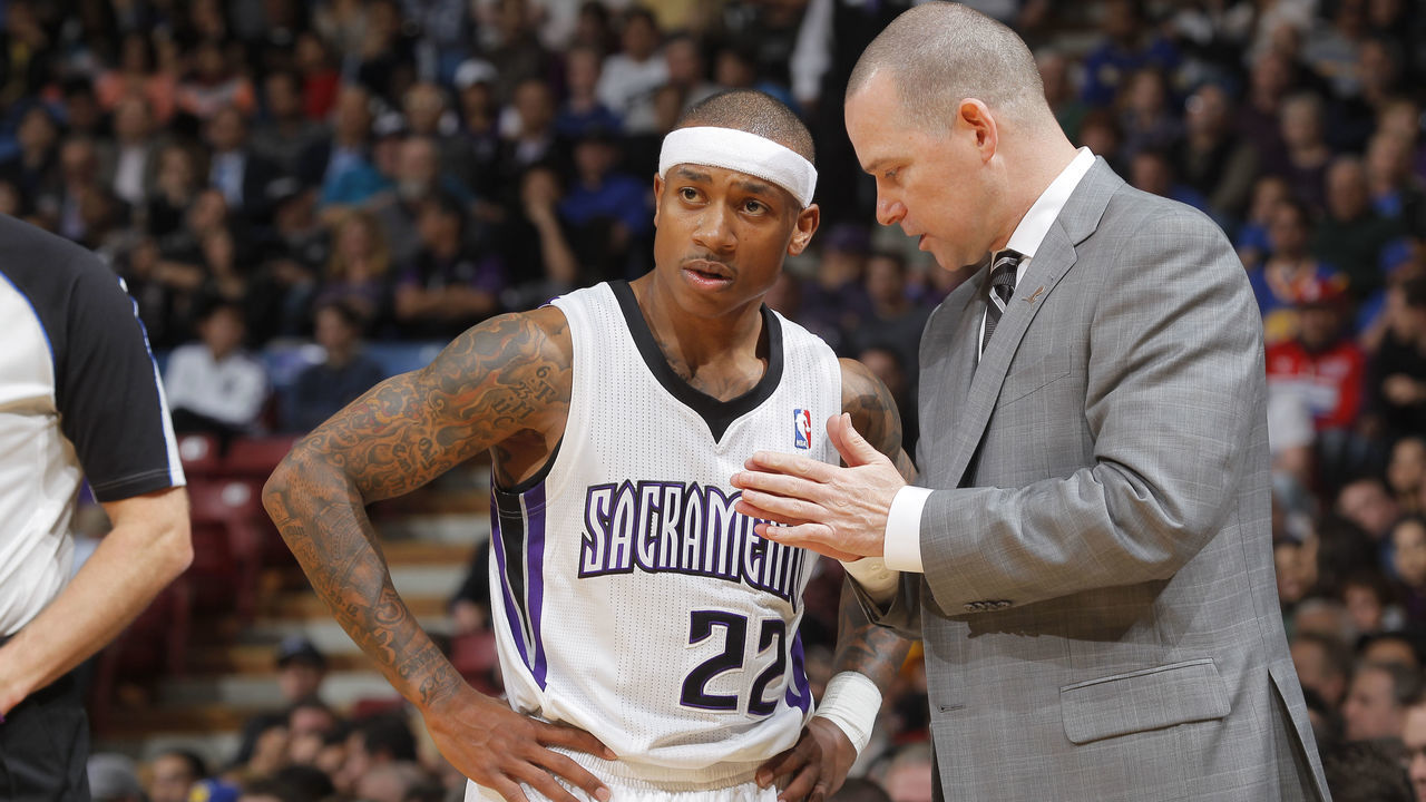 SACRAMENTO, CA - FEBRUARY 19: Head coach Michael Malone of the Sacramento Kings coaches Isaiah Thomas #22 during the game against the Golden State Warriors on February 19, 2014 at Sleep Train Arena in Sacramento, California. NOTE TO USER: User expressly acknowledges and agrees that, by downloading and or using this photograph, User is consenting to the terms and conditions of the Getty Images Agreement. Mandatory Copyright Notice: Copyright 2014 NBAE