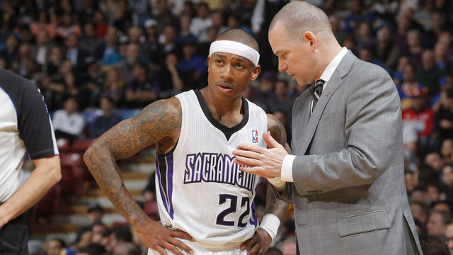 SACRAMENTO, CA - FEBRUARY 19: Head coach Michael Malone of the Sacramento Kings coaches Isaiah Thomas #22 during the game against the Golden State Warriors on February 19, 2014 at Sleep Train Arena in Sacramento, California. NOTE TO USER: User expressly acknowledges and agrees that, by downloading and or using this photograph, User is consenting to the terms and conditions of the Getty Images Agreement. Mandatory Copyright Notice: Copyright 2014 NBAE