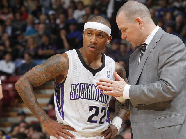 SACRAMENTO, CA - FEBRUARY 19: Head coach Michael Malone of the Sacramento Kings coaches Isaiah Thomas #22 during the game against the Golden State Warriors on February 19, 2014 at Sleep Train Arena in Sacramento, California. NOTE TO USER: User expressly acknowledges and agrees that, by downloading and or using this photograph, User is consenting to the terms and conditions of the Getty Images Agreement. Mandatory Copyright Notice: Copyright 2014 NBAE