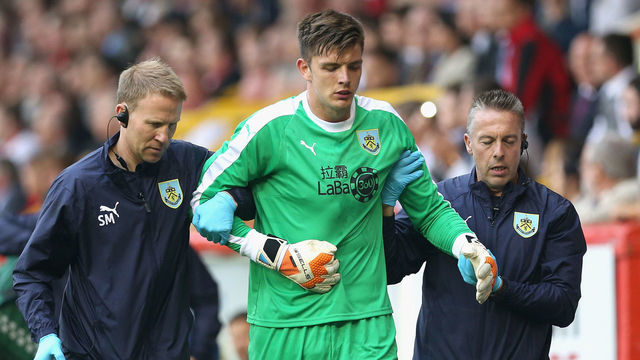 ABERDEEN, SCOTLAND - JULY 26: Nick Pope of Burnley limps off the pitch following an injury during the UEFA Europa League Second Qualifying Round 1st Leg match between Aberdeen and Burnley at Pittodrie Stadium on July 26, 2018 in Aberdeen, Scotland.