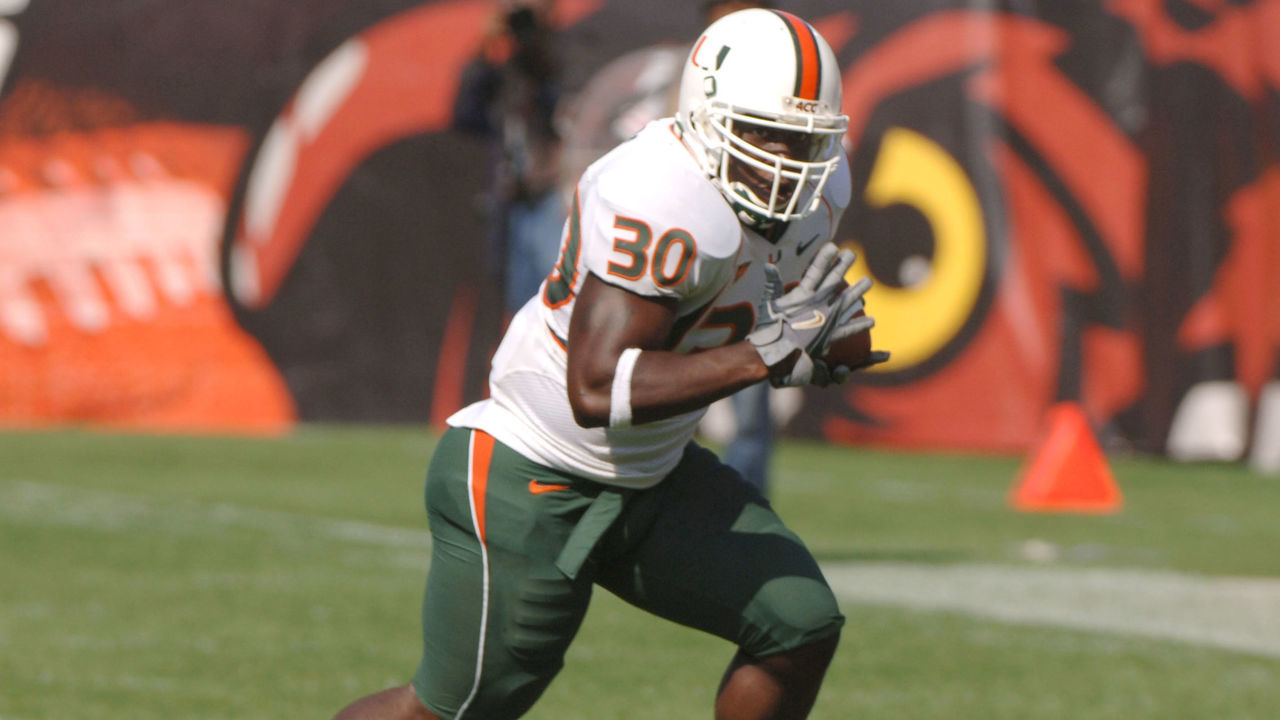 University of Miami running back Tyrone Moss rushes across midfield against Temple at Lincoln Financial Field, October 15, 2005, in Philadelphia. The Hurricanes defeated the Owls 34 - 3.