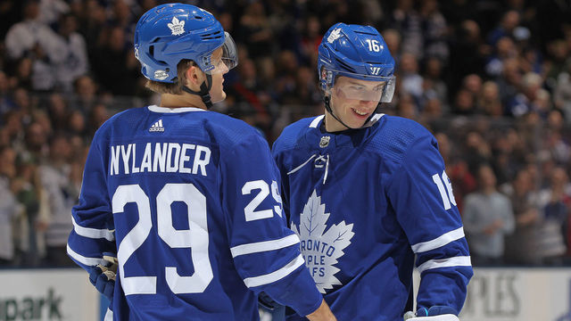 TORONTO, ON - FEBRUARY 10: Mitchell Marner #16 and William Nylander #29 of the Toronto Maple Leafs share a light moment during action against the Ottawa Senators in an NHL game at the Air Canada Centre on February 10, 2018 in Toronto, Ontario, Canada. The Maple Leafs defeated the Senators 6-3.
