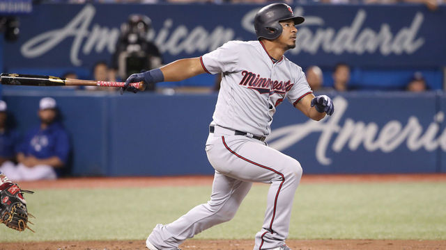 TORONTO, ON - JULY 24: Eduardo Escobar #5 of the Minnesota Twins hits a three-run home run in the eighth inning during MLB game action against the Toronto Blue Jays at Rogers Centre on July 24, 2018 in Toronto, Canada.