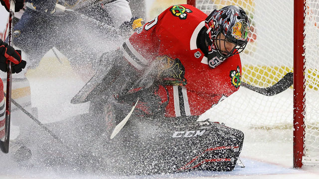CHICAGO, IL - DECEMBER 08: Corey Crawford #50 of the Chicago Blackhawks makes a save against the Buffalo Sabres at the United Center on December 8, 2017 in Chicago, Illinois. The Blackhawks defeated the Sabres 3-2 in a shootout.