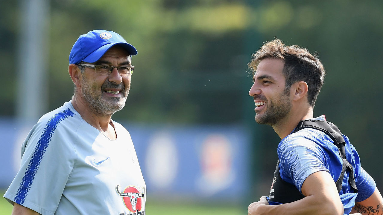 COBHAM, ENGLAND - JULY 26: Maurizio Sarri, Cesc Fabregas and Paolo Bertelli of Chelsea during a training session at Chelsea Training Ground on July 26, 2018 in Cobham, England.