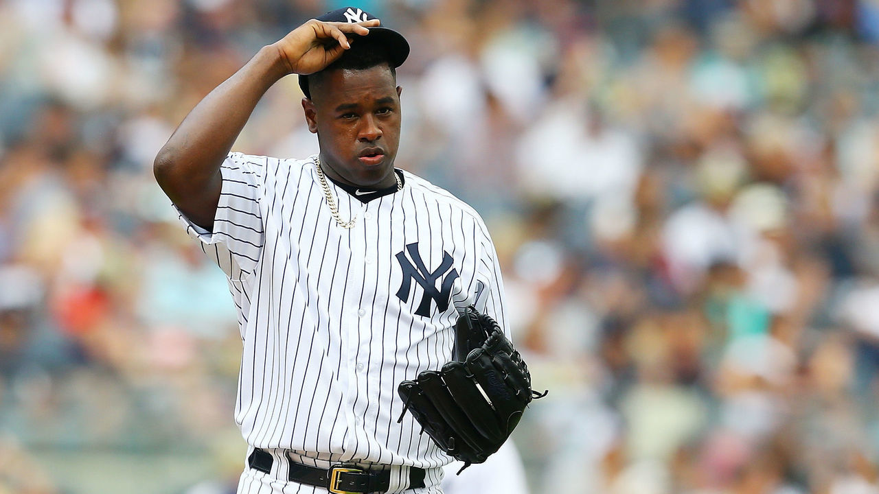 NEW YORK, NY - JULY 28: Luis Severino #40 of the New York Yankees reacts after giving up a 2-run single to Salvador Perez #13 of the Kansas City Royals in the fifth inning at Yankee Stadium on July 28, 2018 in the Bronx borough of New York City.