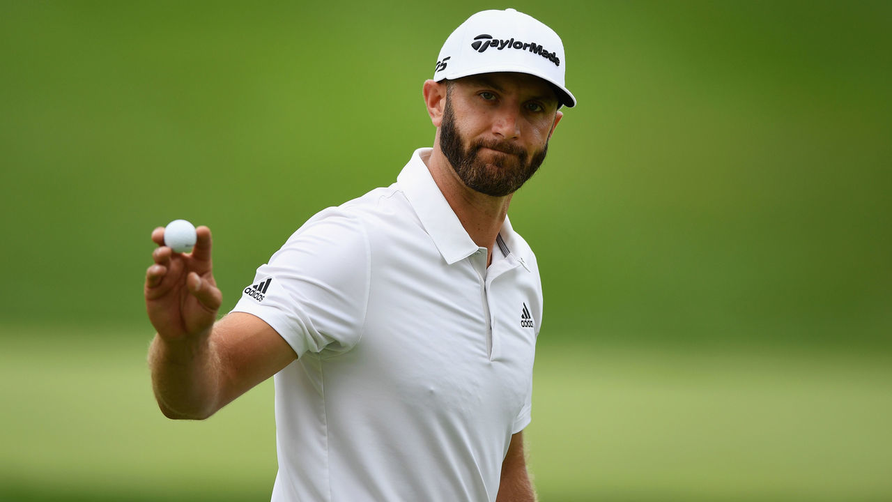 OAKVILLE, ON - JULY 28: Dustin Johnson reacts to his putt during the third round at the RBC Canadian Open at Glen Abbey Golf Club on July 28, 2018 in Oakville, Canada.