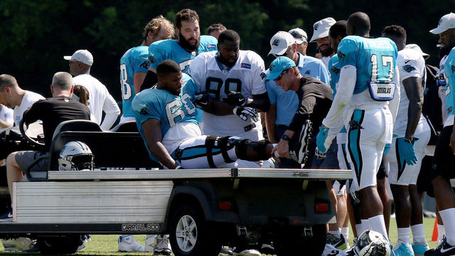 SPARTANBURG, SC - JULY 28: Daryl Williams (60) tackle Carolina Panthers is carried on a cart off the field after an injury to his right leg during the third day of the Carolina Panthers training camp practice at Wofford College July 28, 2018 in Spartanburg, S.C.