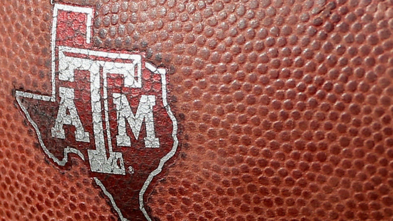 DALLAS, TX - SEPTEMBER 20: A Texas A&M Aggies logo is seen on a football during the first half of their game against the Southern Methodist Mustangs at the Gerald J. Ford Stadium on September 20, 2014 in Dallas, Texas.