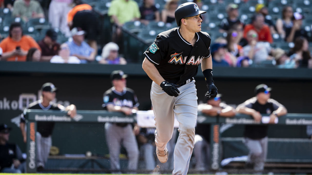 BALTIMORE, MD - JUNE 16: J.T. Realmuto #11 of the Miami Marlins hits a two-run homerun during the third inning at Oriole Park at Camden Yards on June 16, 2018 in Baltimore, Maryland.