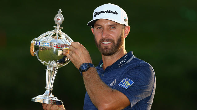 OAKVILLE, ON - JULY 29: Dustin Johnson poses with the trophy during the final round at the RBC Canadian Open at Glen Abbey Golf Club on July 29, 2018 in Oakville, Canada.