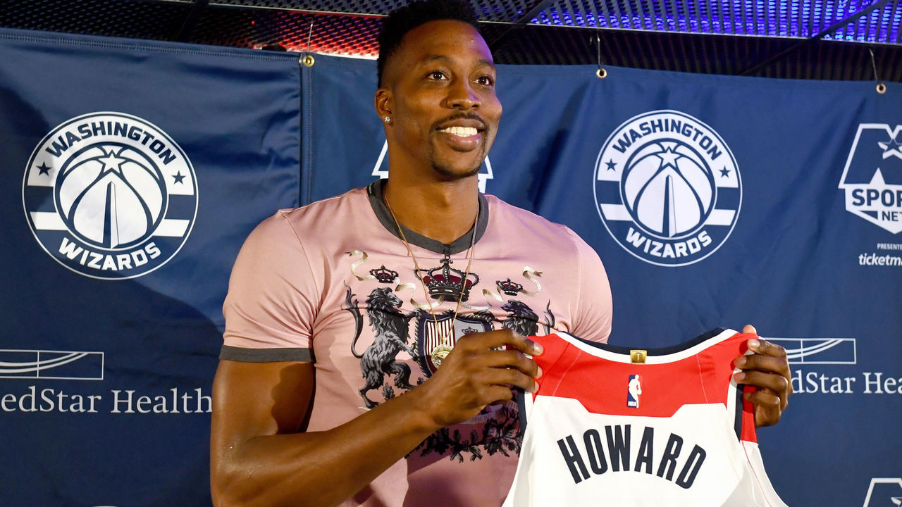 WASHINGTON, DC - JULY 23: Washington Wizards new center Dwight Howard poses with his jersey after a press conference July 23, 2018 in Washington, DC.