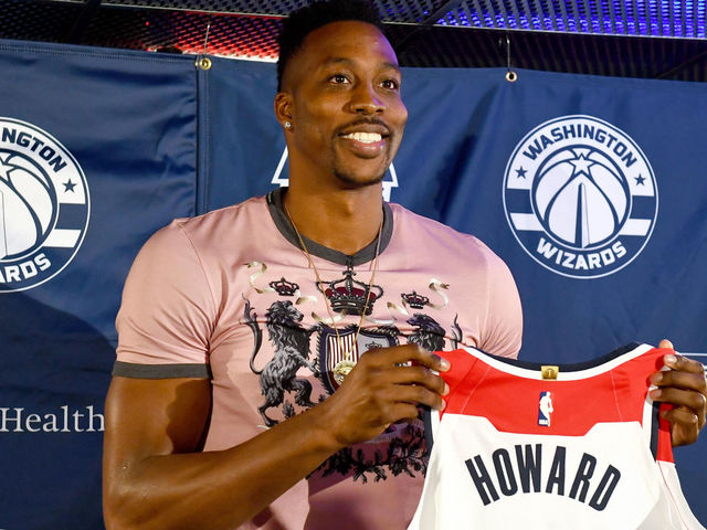 WASHINGTON, DC - JULY 23: Washington Wizards new center Dwight Howard poses with his jersey after a press conference July 23, 2018 in Washington, DC.