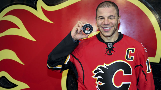 CALGARY, CANADA - JANUARY 07: Jarome Iginla #12 of the Calgary Flames shows off the puck from his 500th goal scored against the Minnesota Wild in NHL action on January 7, 2012 at the Scotiabank Saddledome in Calgary, Alberta, Canada.