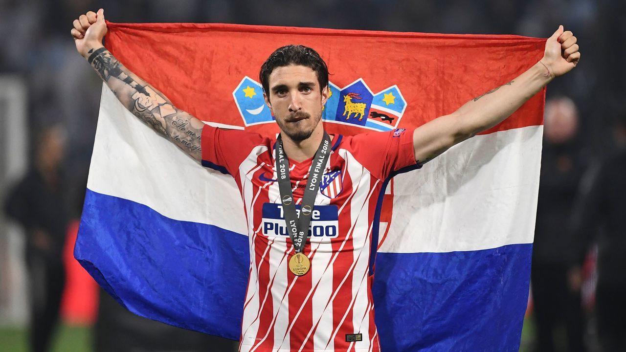 Atletico Madrid's Croatian defender Sime Vrsaljko celebrates after the UEFA Europa League final football match between Olympique de Marseille and Club Atletico de Madrid at the Parc OL stadium in Decines-Charpieu, near Lyon on May 16, 2018.