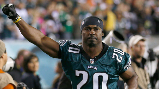 PHILADELPHIA, PA - SEPTEMBER 30: Former Philadelphia Eagles safety Brian Dawkins acknowledges the crowd after being introduced before the start of the Eagles and New York Giants game at Lincoln Financial Field on September 30, 2012 in Philadelphia, Pennsylvania.