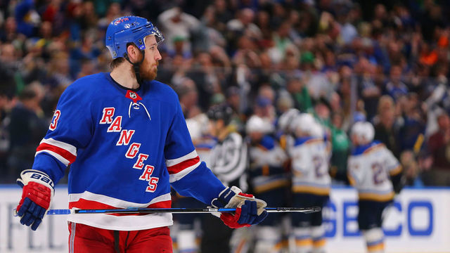 ST. LOUIS, MO - MARCH 17: Kevin Hayes #13 of the New York Rangers reacts after the Rangers loose to the St. Louis Blues in overtime at the Scottrade Center on March 17, 2018 in St. Louis, Missouri.