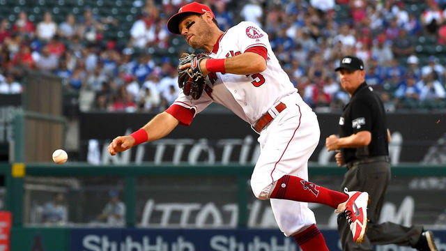 ANAHEIM, CA - JULY 08: Ian Kinsler #3 of the Los Angeles Angels of Anaheim throws out Cody Bellinger of the Los Angeles Dodgers to end the fourth inning of the game at Angel Stadium on July 8, 2018 in Anaheim, California.