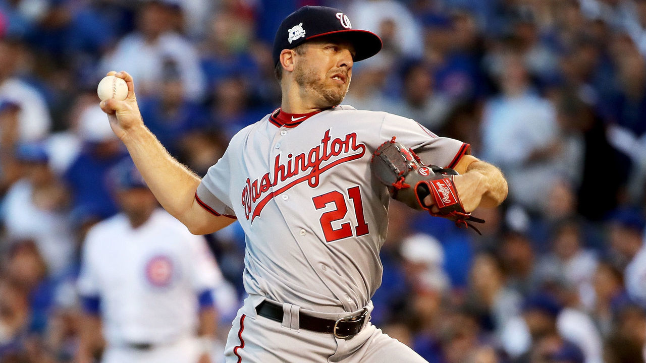 CHICAGO, IL - OCTOBER 09: Brandon Kintzler #21 of the Washington Nationals pitches in the eighth inning against the Chicago Cubs during game three of the National League Division Series at Wrigley Field on October 9, 2017 in Chicago, Illinois.