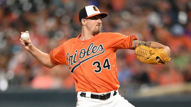 BALTIMORE, MD - JULY 28: Kevin Gausman #34 of the Baltimore Orioles pitches in the fifth inning during a baseball game against the Tampa Bay Rays at Oriole Park at Camden Yards on July 28, 2018 in Baltimore, Maryland.